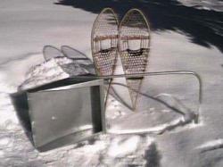 snowshoes and snow scoop